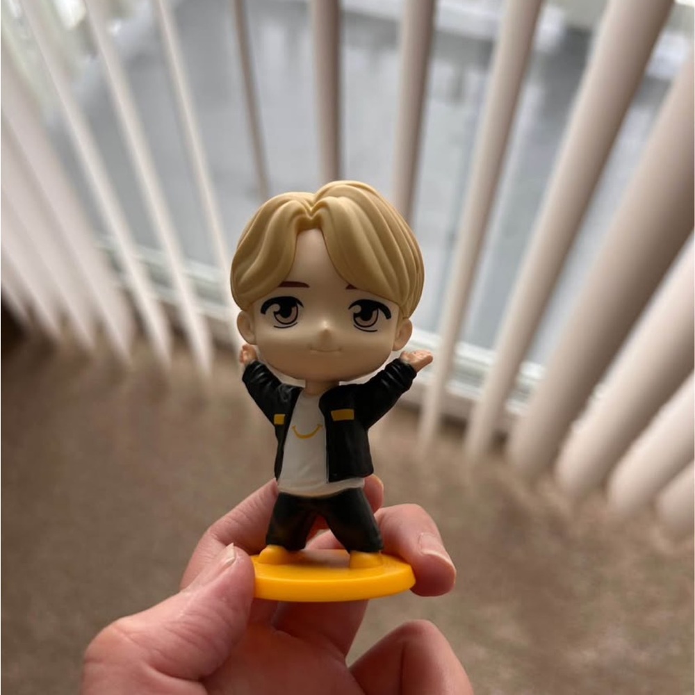 Kids Toy Figure with Black Jacket and Yellow Base